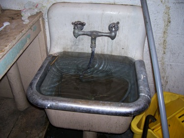 Flooding Sink in School With Mold Problems